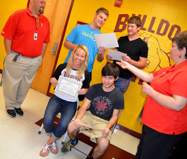 Milam County Clerk, Barbara Vansa, presented certificates of recognition to five students from Thorndale High School who served as county election workers during the March Primary Election. On hand for the presentation last week were (back row, L-R) THS Coach Bobby Sugg, Sterling Kothmann, Lorenzo Llana and Barbara, (Front, L-R) Shelby Anders and Kevin Cooke.  Josh Jones  was not present.
